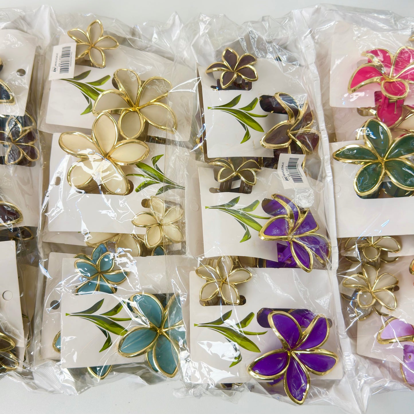 AB-1403 (12 sets) Gold Trim Plumeria Flower Hair Clamp